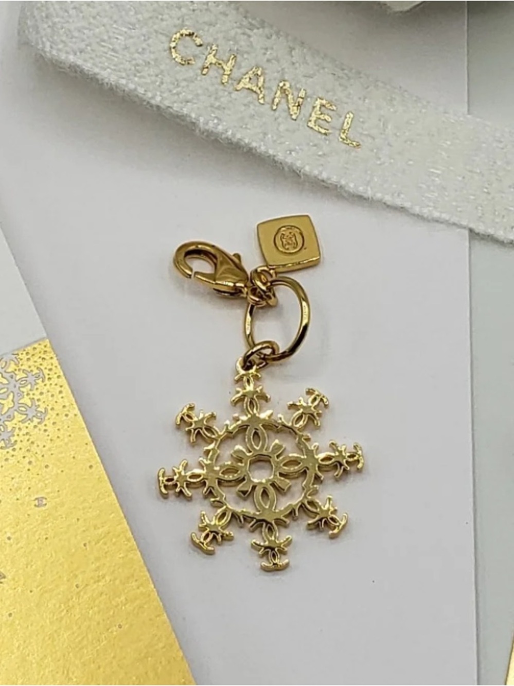 Authentic CHANEL Snowflake Holiday Double Charm Pendant